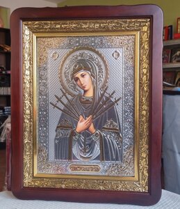 Ікона Божа Матір Семистрільна в темному фігурному кіоті під склом, розмір кіота 53*43, розмір сюжета 30*40
