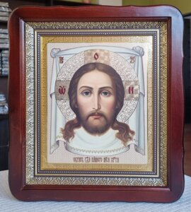 Ікона Нерукотворна Образ Ісуса Хреста у темному фігурному кіоті під склом, розмір кіота 32*29, сюжет 20*24.