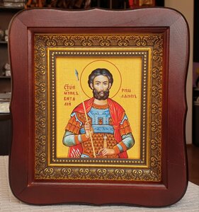 Ікона Святий мученик Віталій у темному фігурному кіоті під склом розмір кіота 20*18, лік 10*12.