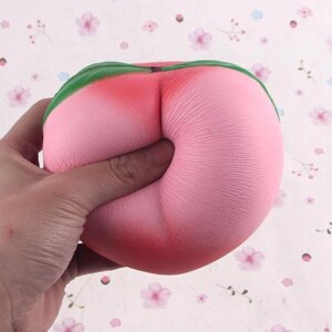 Іграшка-підвіска у вигляді персика антистрес 10см з м’яким кремовим ароматом для повільно зростаючих дітей під