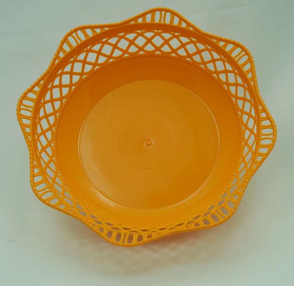 Пластмасовий ажурний круглий кошик для хліба Ø25 см (жовтогарячий колір) від компанії ТОВ "Магія Пласт" - фото 1