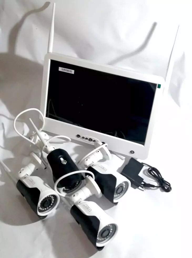 Комплект системы видеонаблюдения UKC DVR KIT LCD 13'' 1304 WiFi 4ch ##от компании## Опт, розница интернет магазин Familyshop - ##фото## 1