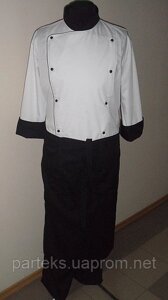 Спецодяг кухаря, білий кітель з фартухом і брюки чорного кольору