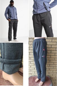 Спортивні штани утеплені на флісі трикотажні великих розмірів із широкою штаниною на високий зріст NIKE