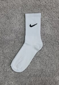 Шкарпетки високі підліткові спортивні бавовняні з логотипом Nike білі
