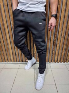 Спортивні теплі підліткові штани зимові з манжетом трикотаж на флісі темно-сірі розмір 44-46