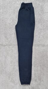 Жіночі теплі спортивні штани з манжетом трикотажні на флісі темно-сині розмір 42-50