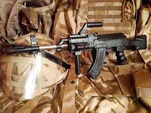 Іграшковий автомат АК-74 "Тактичний": збірно-розбірний, з лазерним прицілом.
