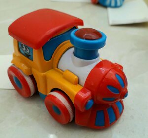 Іграшка Поїзд інерційний металевий "Веселі друзі" помаранчевий