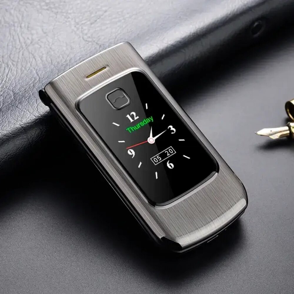 Мобільний телефон розкладачка Yeemi K21 (Tkexun F18) срібло з чорним від компанії Магазин "Astoria-gold" - фото 1