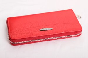 Яскраво червоний шкіряний гаманець на змійці