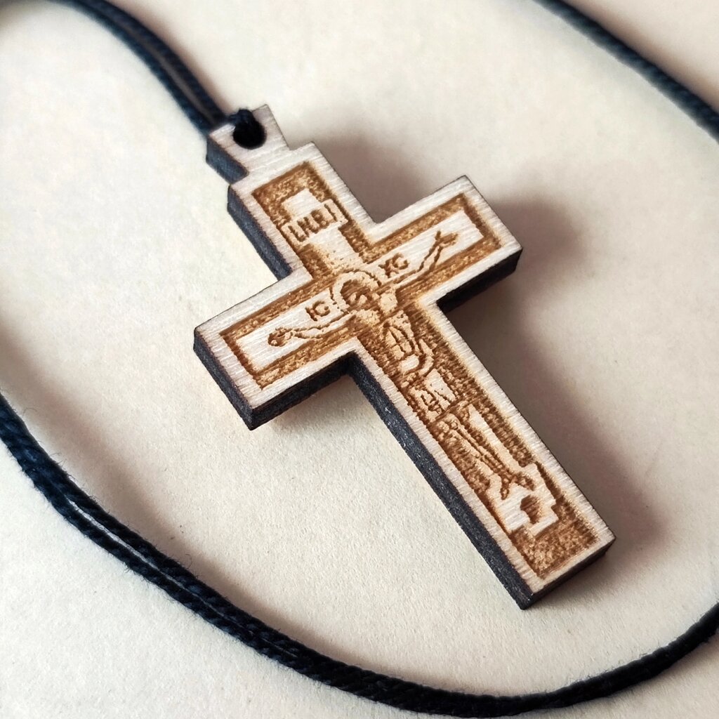 Хрест дерев'яний зі шнурком в комплекті 4*2,3 см від компанії Церковна крамниця "Покрова" - церковне начиння - фото 1