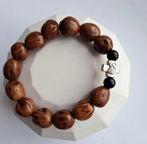 Браслет з мускатного горіха світло-коричневий, діаметр 7 см