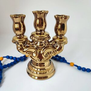 Декоративний керамічний тримач для свічок золотий