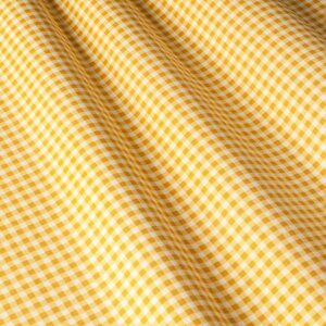 Тканина в дрібну клітку жовтого кольору