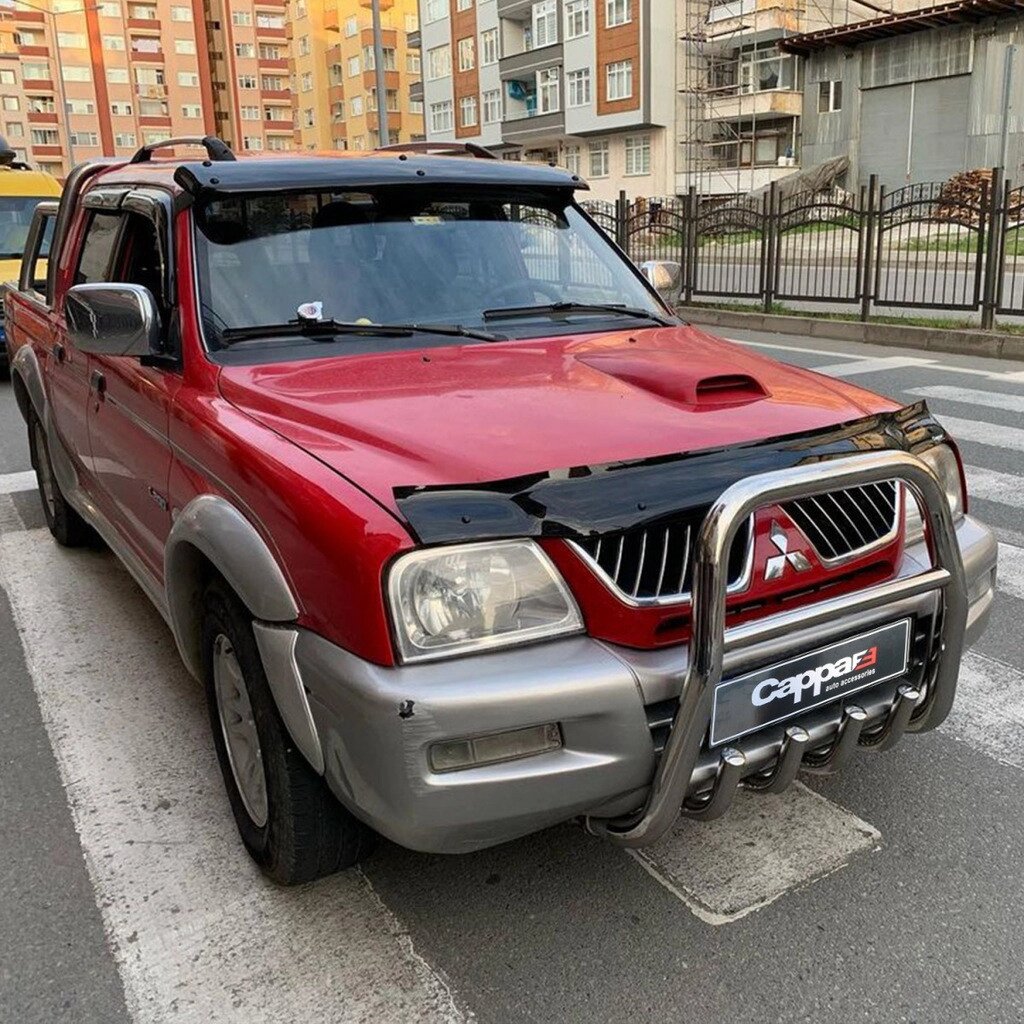 Дефлектор капоту (мухобойка) Mitsubishi L200 1996-2006 від компанії Тюнінг і аксесуари для авто - фото 1