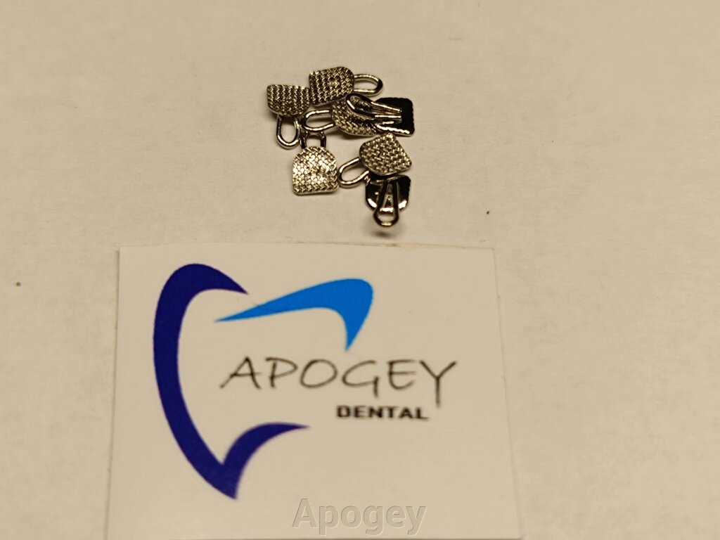 Кнопка лінгвальна прямокутна люверс ApogeyDental ***Ціна за 1 шт від компанії Apogey - фото 1