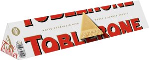 Шоколад білий трикутний Toblerone з медово-мигдальною нугою 100г