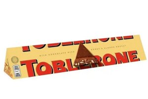 Шоколад молочний трикутний Toblerone з медово-мигдальною нугою 100г