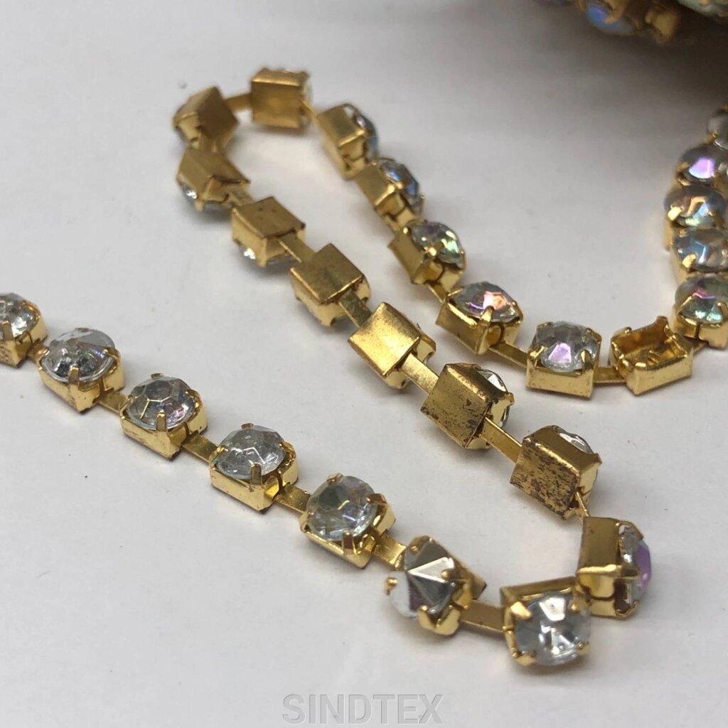 1м - Стразовий ланцюг SS 18 (4,5 мм) Акриловий райдужний кристал у золоті від компанії SINDTEX - фото 1