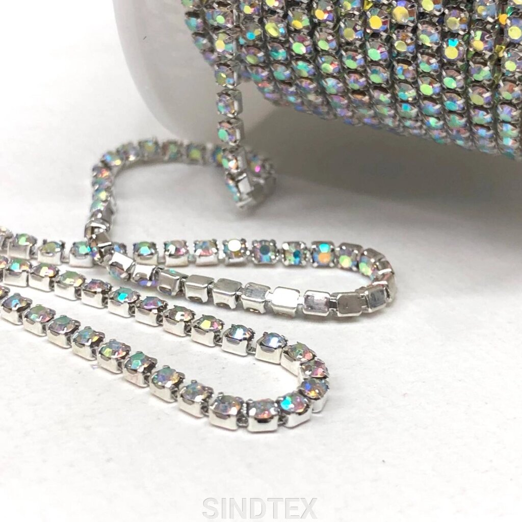 1м - Стразовий ланцюг SS8 (2,5мм), Кристал з покриттям АВ у сріблі від компанії SINDTEX - фото 1