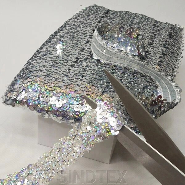 Декоративна тасьма-резинка з паєтками, срібло з переливом від компанії SINDTEX - фото 1