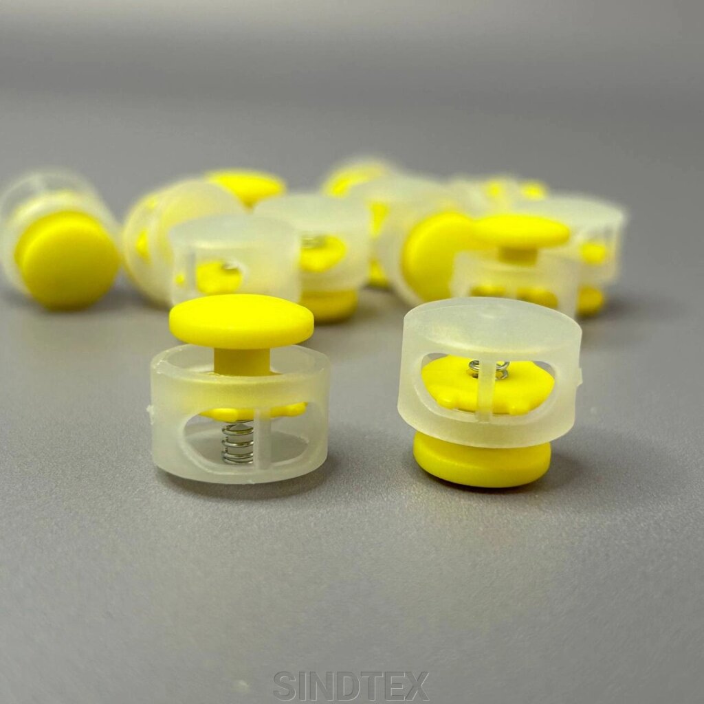 Фіксатор бочонок для шнура пластиковий 16 мм, матовий жовтий від компанії SINDTEX - фото 1