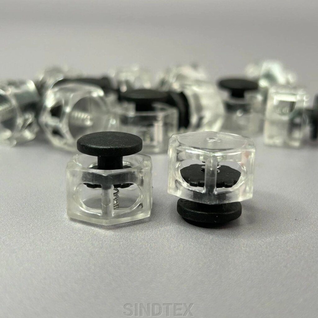 Фіксатор бочонок для шнура пластиковий 17 мм, прозорий чорний від компанії SINDTEX - фото 1