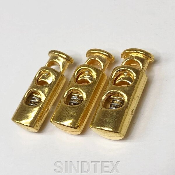 Фіксатор для шнура пластиковий 23 мм, колір: золото від компанії SINDTEX - фото 1