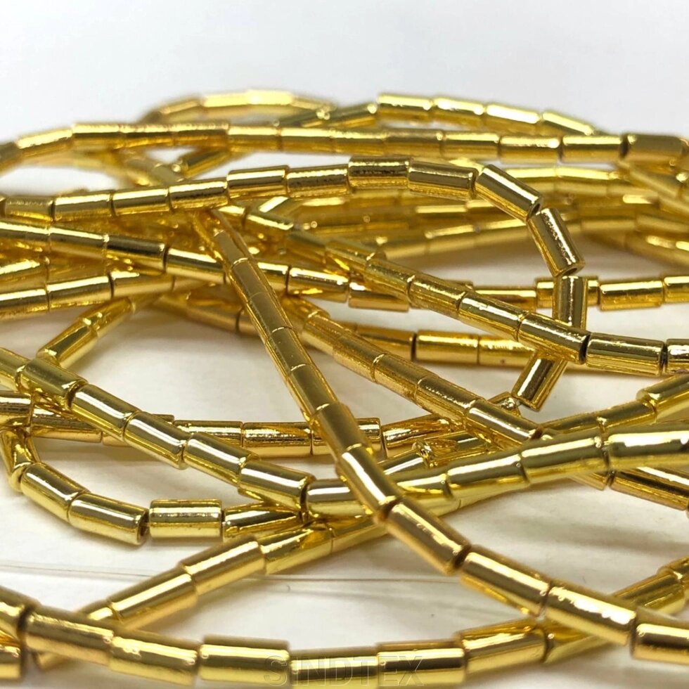 Намистини Гематит трубочка 2х4 мм, (90шт) - колір Лимонне золото від компанії SINDTEX - фото 1