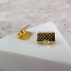 Затискач для стрічок і шнура 10 мм, уп 10 шт - жовте золото в Одеській області от компании SINDTEX