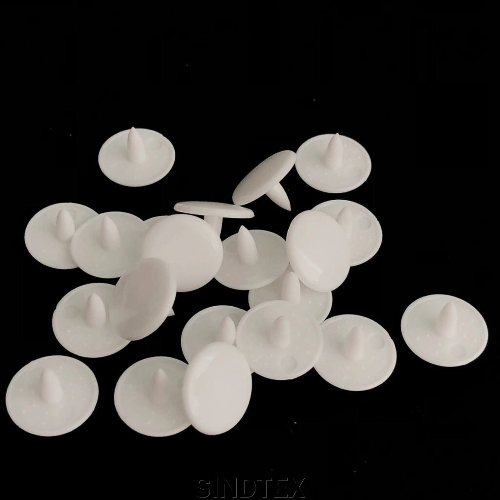 Пластикова кнопка 10 мм білий k (1440шт) (321010) від компанії SINDTEX - фото 1