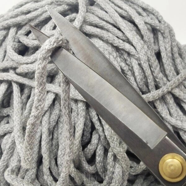 Шнур сірий меланж круглий плетений 0,6 см (акрил) "бавовна" від компанії SINDTEX - фото 1