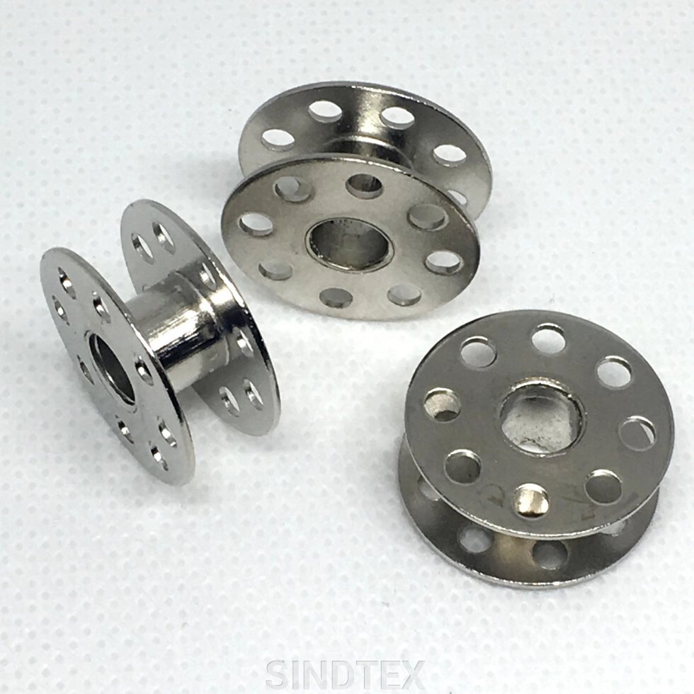Шпулька 9 мм/21 мм для швейних машин (метал з отворами) від компанії SINDTEX - фото 1