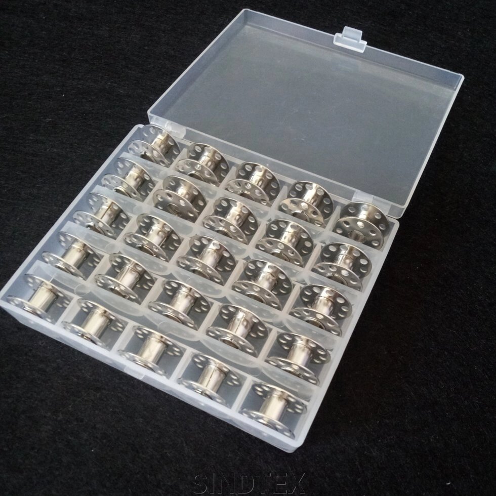 Шпульки 11 мм/21 мм для швейних машин (метал з отворами) в органайзері від компанії SINDTEX - фото 1