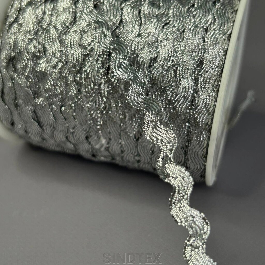 Тасьма В'юнок 6 мм - Срібло парча від компанії SINDTEX - фото 1