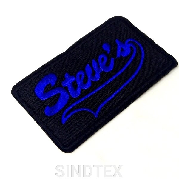 Термонаклейка-нашивка Steve`s-1, 6х10см синя напис від компанії SINDTEX - фото 1