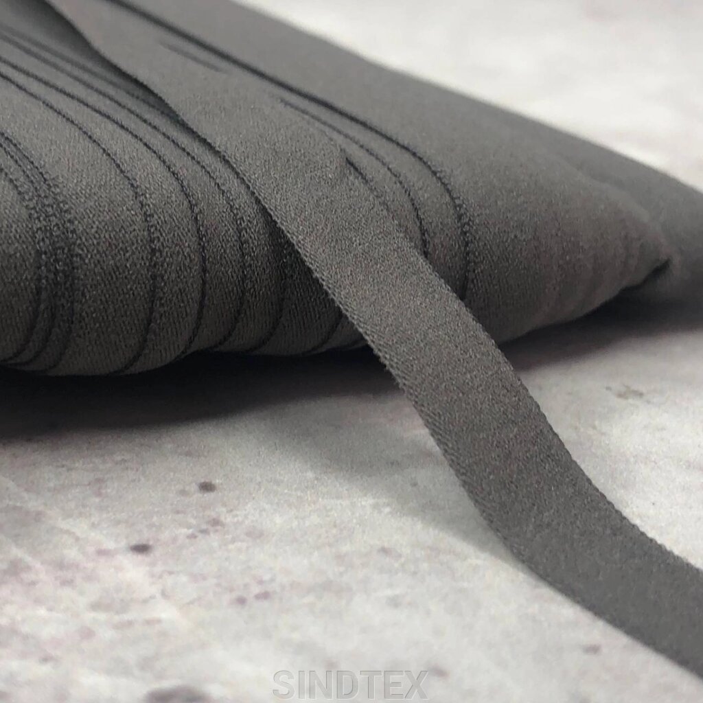 Трикотажна окантувальна бейка (еластична, стрейч) 1см - темний сірий від компанії SINDTEX - фото 1