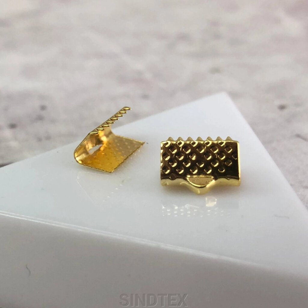 Затискач для стрічок і шнура 10 мм, уп 10 шт - жовте золото від компанії SINDTEX - фото 1