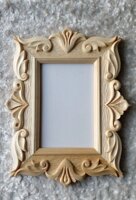 Дзеркала в різьблених дерев'яних рамках
