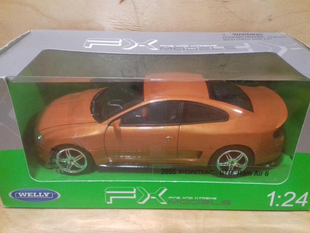 Колекційна машинка 2005 Pontiac GTO 1:24 метал Іграшка модель від компанії Premium - фото 1