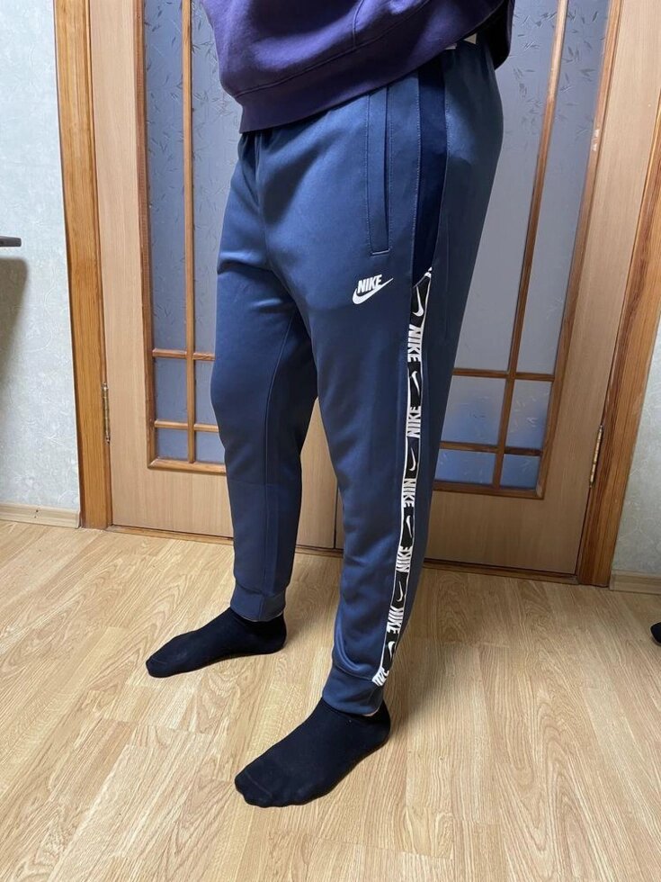 Спортивні штани Nike M Nsw Repeat Pk Jogger DM4673-437 M,L від компанії Premium - фото 1