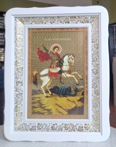 Ікона Святий Георгій Побідоносець на білому фігурному кіоті під склом, розмір кіота 30*40, розмір сюжету 20*30.