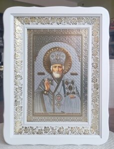 Ікона Святий Миколай Чудотворець у білому фігурному кіоті під склом, розмір кіота 30*40, розмір сюжету 20*30.