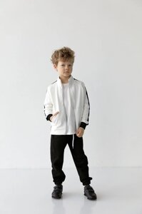 Спортивний костюм для хлопчика білого кольору з чорним 406589