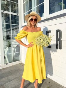 Жіноча сукня, виготовлена ​​з натуральної жовтої тканини 372905