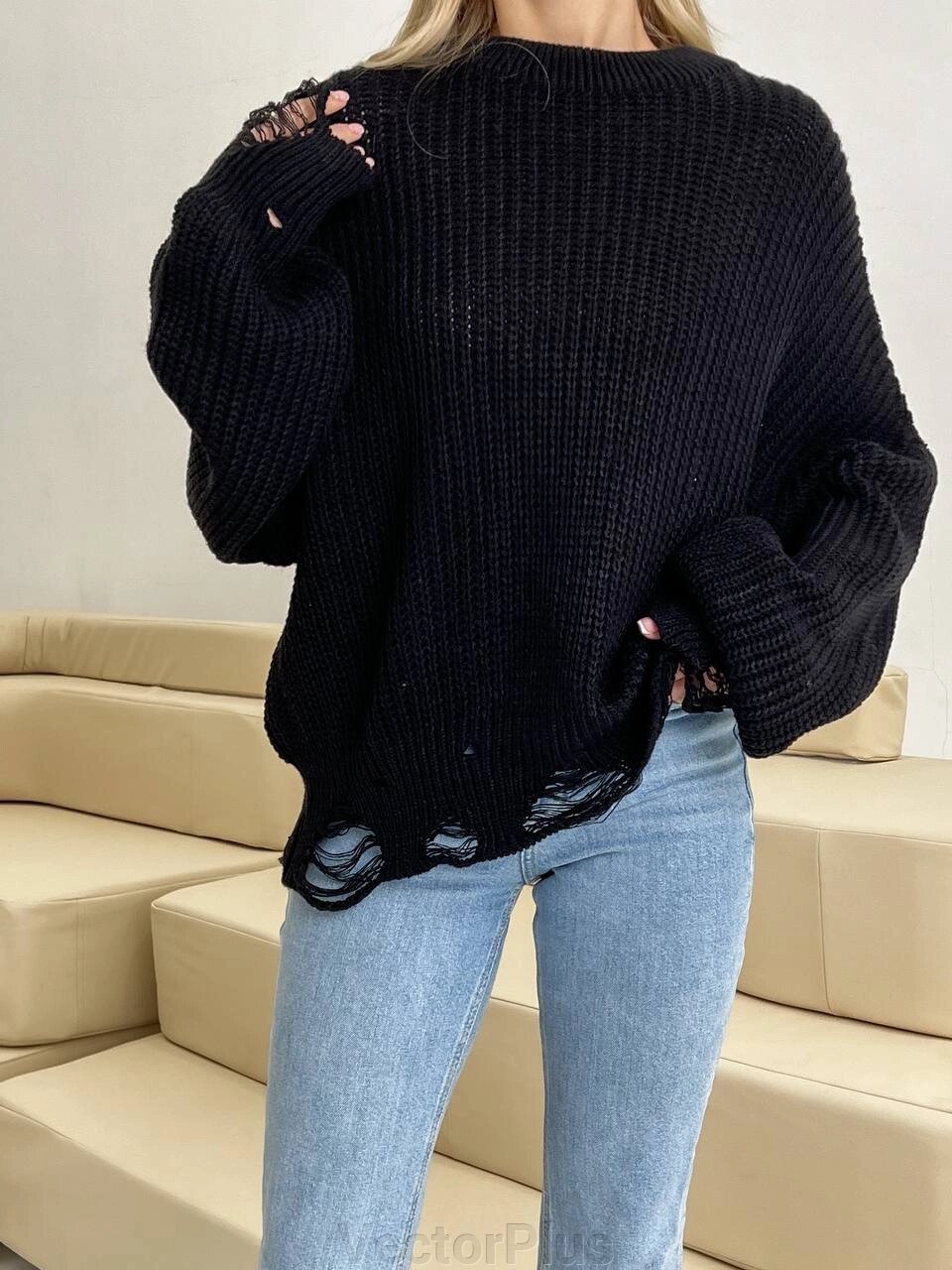 Жіночий светр з чорними дірками r. 42/46 407264 від компанії VectorPlus - фото 1