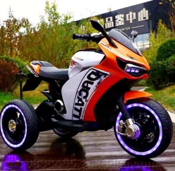 Дитячий електромобіль мотоцикл трицикл M 4053L-7 Ducati пластикові колеса, що світяться, шкіряне сидіння від компанії Мір товарів - фото 1