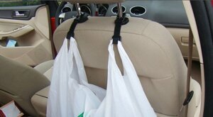 Два гачки для сумки в машині під підголівником