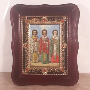 Ікона святителі Василь Великий, Григорій Богослов та Іоанн Золотоуст, лик 10х12 см, у темному кіоті з камінням